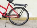 Detail of the wheel on old red bicycle Royalty Free Stock Photo
