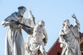 White marble statues surrounding the Plague Column in Maribor, Slovenia