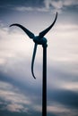 Detail of a windmill with storm clouds Royalty Free Stock Photo