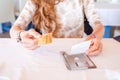 Woman paying restaurant bill with credit card