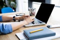 Detail of woman`s hand typing on a laptop keyboard. Royalty Free Stock Photo