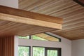 Detail of wood beam ceiling in a modern house entryway