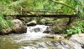 Wood bridge over Chae Son waterfall in Chae Son National Park in Lampang Province, Thailand