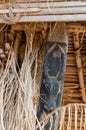 Detail of wood carving of black cow at traditional Fon`s palace in Bafut, Cameroon, Africa