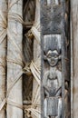 Detail of wood carving of human on pillar at traditional Fon`s palace in Bafut, Cameroon, Africa Royalty Free Stock Photo