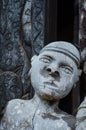 Detail of wood carving of male human at traditional Fon`s palace in Bafut, Cameroon, Africa Royalty Free Stock Photo
