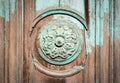 Detail of wooden door, flower ornat