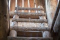 Detail of wooden ladder of an ancient watchtower. Royalty Free Stock Photo