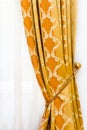 Detail of yellow vintage drapery Royalty Free Stock Photo
