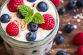 Detail of Yogurt with Fresh Berries on Woden Table Royalty Free Stock Photo