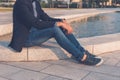 Detail of a young handsome man posing in the city streets Royalty Free Stock Photo