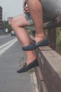 Detail of a young handsome man posing in the street Royalty Free Stock Photo