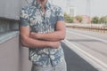 Detail of a young handsome man posing in the street Royalty Free Stock Photo