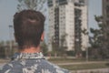 Detail of a young handsome man posing in the street Royalty Free Stock Photo