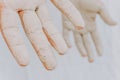 Detail of a young man hand dirty of clay and mud. Selective focus. Abstract and creative photo of human fingerprint