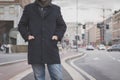 Detail of a young man posing in the city streets Royalty Free Stock Photo