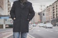 Detail of a young man posing in the city streets Royalty Free Stock Photo