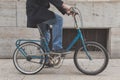 Detail of a young man posing with his bicyle Royalty Free Stock Photo