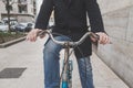 Detail of a young man posing with his bicyle Royalty Free Stock Photo