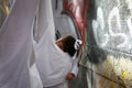 Penitents waiting for the start of an easter holy week procession in mallorca detail on hoods vertical