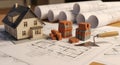 Architectural Model House Blueprints Bricks and Trowel Royalty Free Stock Photo