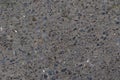 Detailed asphalt texture with small rocks offers a versatile background for construction or design projects Royalty Free Stock Photo