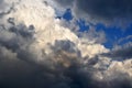 Detailed black and white clouds joining together