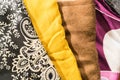 Detailed black, white, yellow, brown and magenta clothes