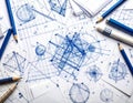 Detailed Blue Technical Drawing with Pencils and White Paper on a Surface Royalty Free Stock Photo
