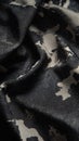 Detailed close-up of black and grey camouflage fabric, textile texture concept Royalty Free Stock Photo