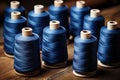 Detailed Close Up of Blue Thread Wrapped Around Spool with Intricate Texture and Pattern