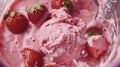 A detailed close-up of a bowl filled with creamy vanilla ice cream topped with fresh red strawberries Royalty Free Stock Photo