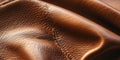 Detailed close-up of classic tan leather, capturing its rich grain and smooth texture, emphasizing Royalty Free Stock Photo