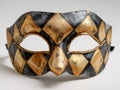 Elegant Black And Gold Diamond Pattern Masquerade Mask With Glitter Accents on White Background Royalty Free Stock Photo