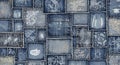 Detailed close-up of a denim patchwork background with floral and abstract patterns Royalty Free Stock Photo