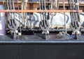 Detailed close up detail of ropes and cordage in the rigging of an old wooden vintage sailboat Royalty Free Stock Photo