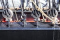 Detailed close up detail of ropes and cordage in the rigging of an old wooden vintage sailboat Royalty Free Stock Photo