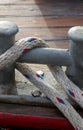 Detailed close up detail of ropes and cordage in the rigging of an old wooden vintage sailboat Royalty Free Stock Photo