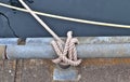 Detailed close up detail of ropes and cordage in the rigging of an old wooden vintage sailboat Royalty Free Stock Photo