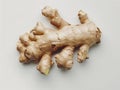 A detailed close-up of a ginger root on a white background Royalty Free Stock Photo