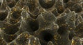 Black undulating surface speckled with golden dust Royalty Free Stock Photo