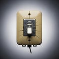 Close-up of an Old and Broken Light Switch with Scratches in a Neutral Background, Metal Toggle Showing Wear and Tear, Detailed Royalty Free Stock Photo