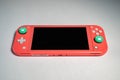 Detailed close up photo of Coral Nintendo Switch Lite