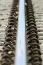 Detailed close up photo of a railroad track