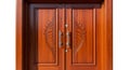Close-up of a Polished Wooden Double Door with Intricate Leaf Carvings and Silver Handles Royalty Free Stock Photo