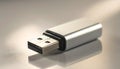 Close-up of a silver USB flash drive with USBA connector on a reflective surface storage Royalty Free Stock Photo