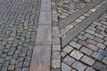 Detailed close up texture on a cobblestone street found in northern europe