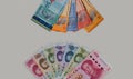 close up to the Chinese and Malaysian currency on white grey background Royalty Free Stock Photo