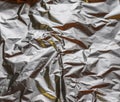 Detailed close up view on colorful lightened aluminum foil textures Royalty Free Stock Photo