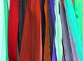 Detailed close up view on colorful textile fabrics textures found on a german fabrics market Royalty Free Stock Photo